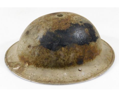 A 20thC tin army helmet, stamped 1959 ROC, with leather inner webbing and chin strap, 17cm H, interior measurements approx. 2