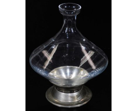 A glass vase decanter, in the manner of Baccarat, with a swirl decoration on a plated stand, 27cm H. (unmarked)