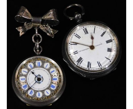 An early 20thC ladies fob watch, marked fine silver, with bow top, fancy 3cm Dia. Roman numeric dial, with tooled centre and 