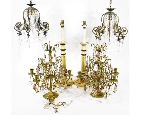 A pair of George IV style gilt and cut glass mounted multi-light candelabra, with shaped central sections, with graduated ste