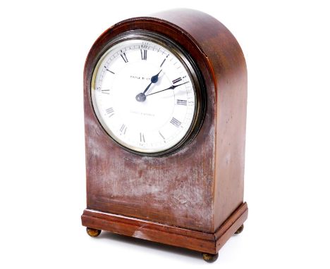 A Maple &amp; Co Edwardian mahogany cased mantel clock, of domed form, partially inlaid with a raised glass revealing an 8cm 