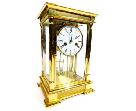 Rapport of London.  A 20thC brass and glazed mantel clock, of rectangular form, the four piece glass case holding a 10cm Dia.