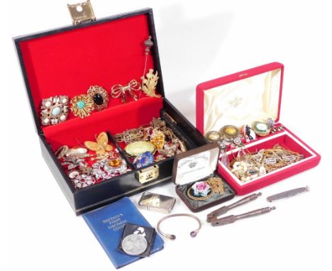 A quantity of modern costume jewellery and effects, to include gold plated necklaces, brooches, clip on earrings, fob watches