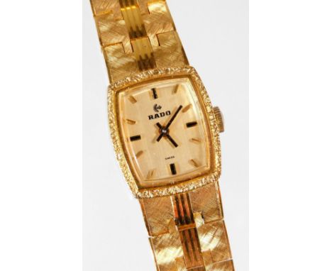 A Rado ladies cocktail watch, with 2cm W dial, baton pointers and numerals, shaped gold plated bracelet with stainless steel 