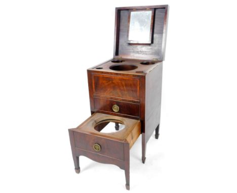 An early 19thC mahogany washstand, of square form, the hinged lid with a wide crossbanding revealing a fitted interior above 