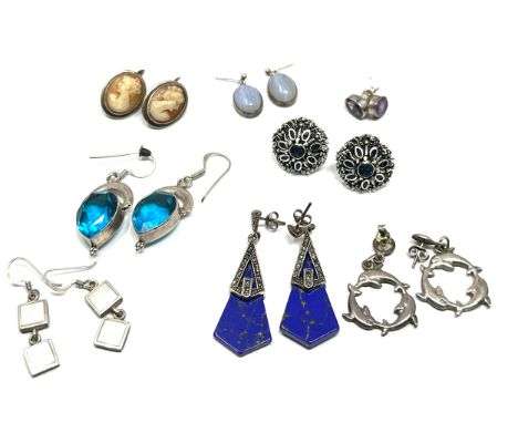 8 pairs of vintage silver earrings