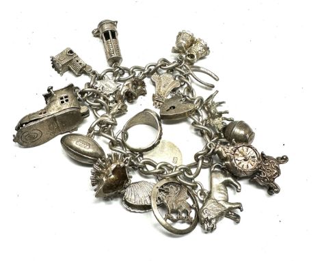 Vintage silver charm bracelet and charms weight 72g