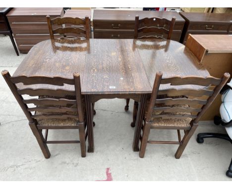 AN EARLY 20TH CENTURY OAK GATE LEG DINING TABLE 58" X 35" OPEN AND FOUR LANCASHIRE STYLE LADDER BACK CHAIRS WITH RUSH SEATS 