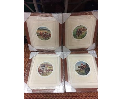 A SET OF FOUR FRAMED LIMITED EDITION PRINTS OF RACING SCENES BY CLAIRE EVA BURTON 
