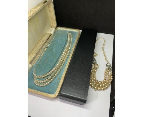 TWO PEARL NECKLACES WITH PRESENTATION BOXES 
