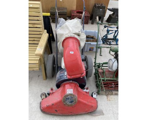 A BILLY GOAT TRASH GARDEN VAC, WITH A HONDA 3.5 HP ENGINE 