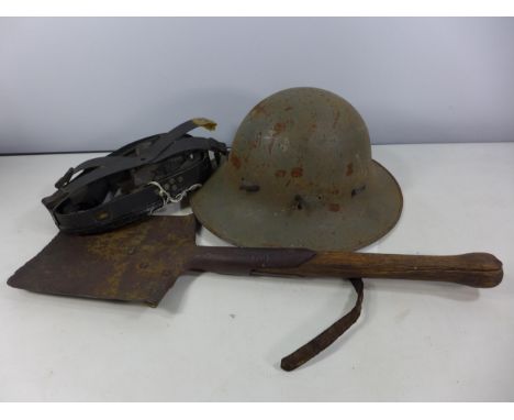 A WORLD WAR II ENTRENCHING TOOL DATED 1940, LENGTH 53CM, AND A GREY PAINTED MILITARY HELMET DATED 1941, AND A LINER (3) 