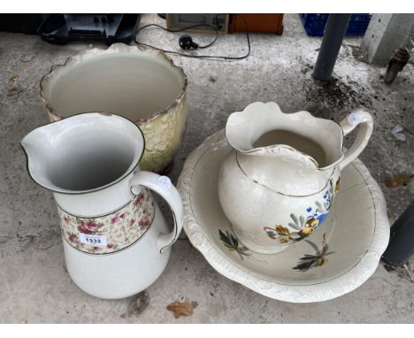AN ASSORTMENT OF CERAMIC WARE TO INCLUDE A MATCHING JUG AND WASH BOWL, A FURTHER JUG AND A PLANTER 