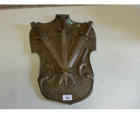 AN UNUSUAL WALL MOUNTED DISPLAY OF THREE VICTORIAN LEE METFORD BAYONETS, 30CM BLADES, ONE MARKED WILKINSON, MOUNTED ON AN ART