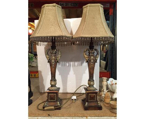 A PAIR OF DECORATIVE TABLE LAMPS WITH BEAD FRINGED LAMP SHADES 