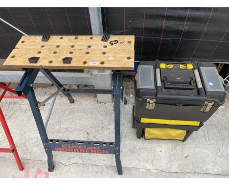 AN ADJUSTABLE WORK BENCH AND A TOOL BOX CONTAINING TOOLS 