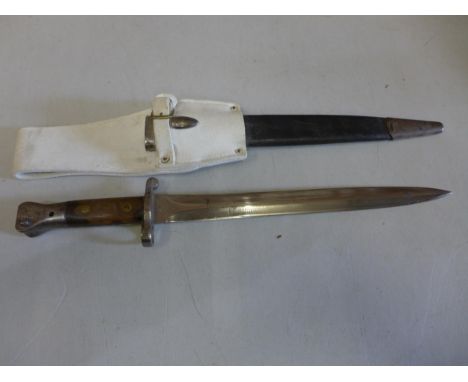 A LEE ENFIELD AND METFORD BAYONET BY WILKINSON, LONDON, 30.5CM BLADE, COMPLETE WITH SCABBARD 