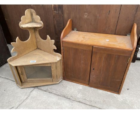 A PINE CORNER SHELF AND TWO DOOR WALL CUPBOARD 