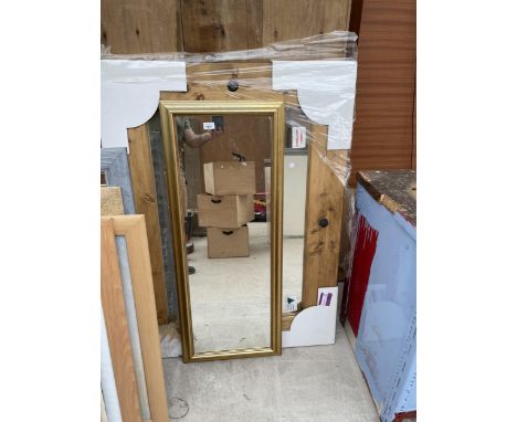 A LARGE PINE FRAMED MIRROR AND A FURTHER MIRROR 