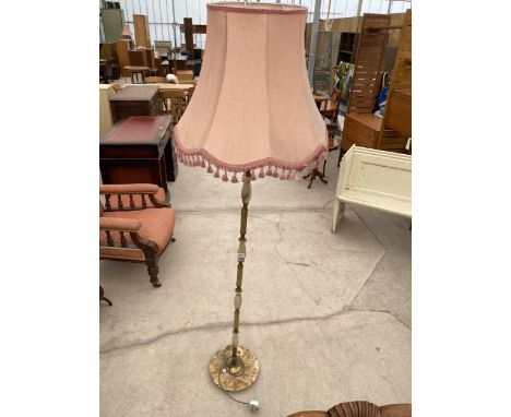 AN ONYX EFFECT STANDARD LAMP 