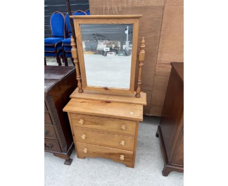A MODERN PINE THREE DRAWER CHEST 22.5" WIDE AND A SWING FRAME MIRROR 