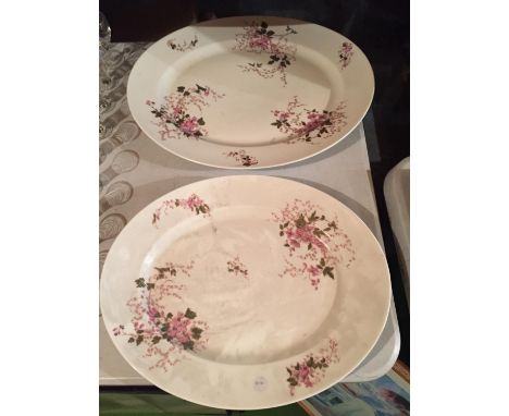 TWO LARGE HEAVY CERAMIC MEAT PLATTERS WITH A DELICATE PINK FLOWER DESIGN 