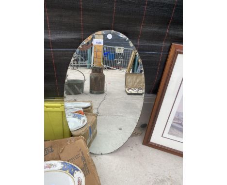 AN ART DECO STYLE BEVELED EDGE MIRROR 
