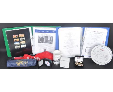 A collection of 1990s Queen Elizabeth 2 QE2 cruise memorabilia comprising of a pair of folders housing QE2 Daily Programmes&n