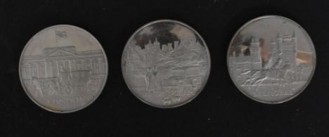 A collection of three Queen Elizabeth II 1977 Royal Silver Jubilee coins with various royal residence including London, Sandr