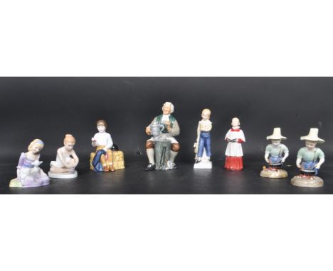 An assortment of Royal Doulton porcelain china figurines to include River Boy HN 2128, First Prize HN 3911, Ballet Shoes, Mar