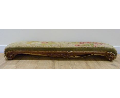 19th century mahogany framed fender stool on scroll supports with needlework top. 130cm x 28cm. 