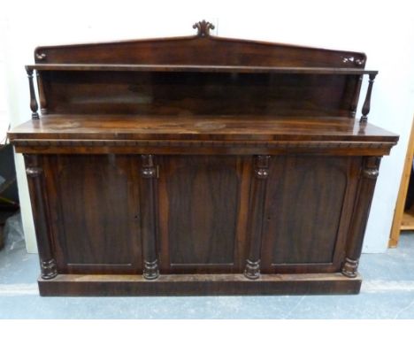 Victorian mahogany sideboard the raised back with shelf over rectangular moulded edge top with three panel doors below with t