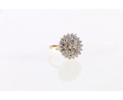 Diamond princess cluster ring with three tiers of brilliants in gold. Size 'K'. 