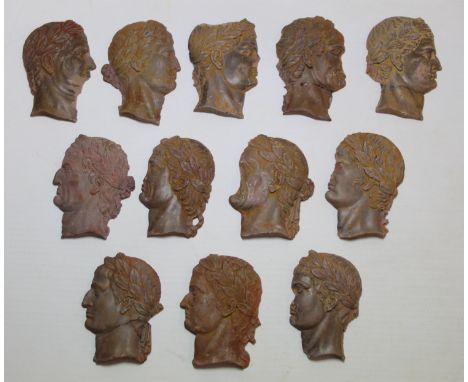 Set of twelve 19th century Grand Tour bas relief small plaster portrait plaques of Roman Emperors, each approx. 6½cm high, so