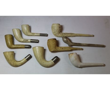 Five Victorian clay pipe heads with white metal bands by C.Crop, Huxton, London unsmoked 1840-1861, the largest 8.5cm long al