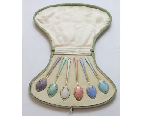 Set of six silver gilt coffee spoons with floral polychrome enamel, 1913, cased.Condition:Pale blue - Small chip on handle si