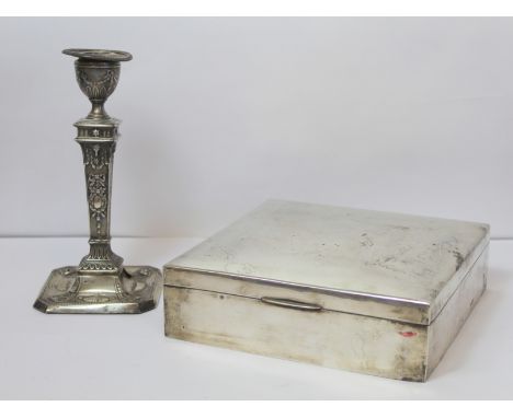 Egyptian plain silver cigar box, 18cm square; also a candlestick 1902, loaded. (2). 