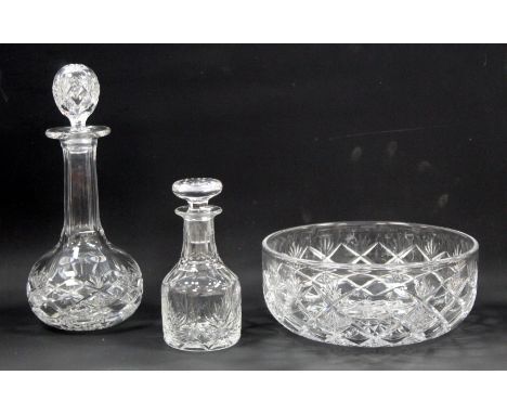 Cumbrian Crystal globe and shaft decanter with engraved initials E.P.; a similarly engraved fruit bowl and a small decanter.&