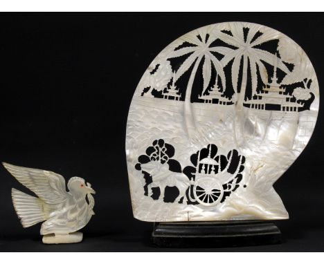 Late 19th/early 20th century Eastern pierced mother-of-pearl souvenir plaque decorated with carriage being pulled by an ox in
