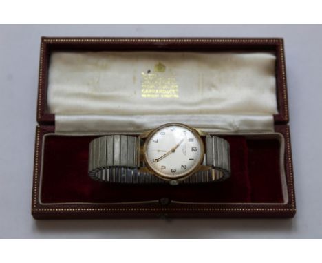 Gent's Longines 9ct gold watch, manual, inscribed 1979, rolled gold bracelet.Condition report:Runs and stops , needs attentio