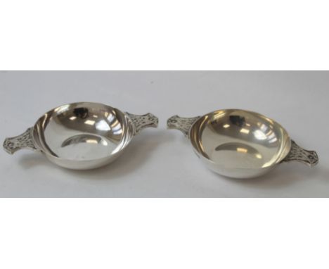 Pair of silver quaiches the grips with Celtic decoration by Wakeley &amp; Wheeler 1949. 5½&nbsp;oz. 