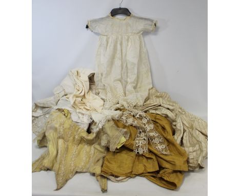 Vintage silk and lace edged baby's gown, Victorian lace edged petticoat, a cream silk and an ochre taffeta skirt (a/f), a yel