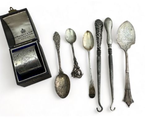 A range of silver and white metal . Includes a boxed Victorian silver napkin ring by Walter &amp; John Barnard, London 1884, 