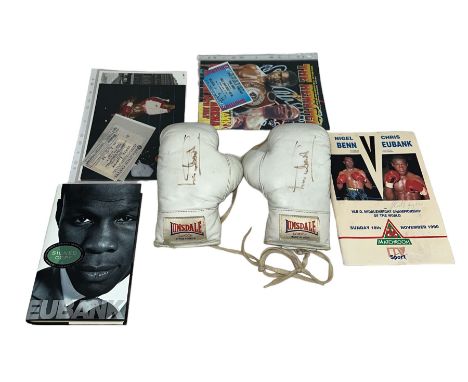 Chris Eubank (British, b.1966), pair of signed white Lonsdale boxing gloves, signed by boxing legend Chris Eubank. Both signe