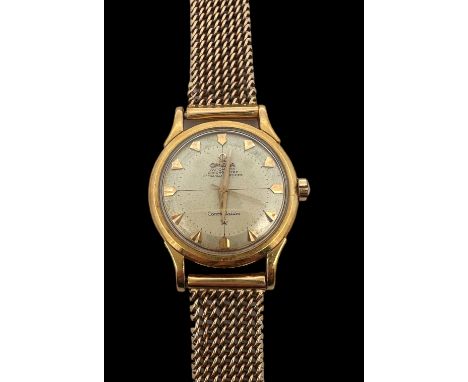 Omega- A gents Omega 1950s Constellation Automatic Chronometer pie pan watch. Champagne dial and arrow head hour markers. Aut