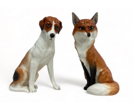 Royal Worcester fox (No. 2993) and hound (No. 2994) figurines. Stamp to base. Fox 19cm high. Very good condition.