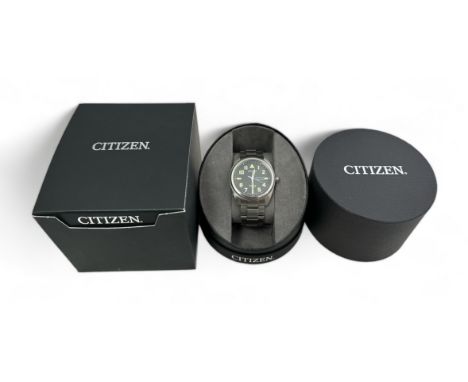 Citizen Eco-Drive Titanium wristwatch with 42mm case, black dial with yellow easy-to-read numerals, features a sapphire cryst