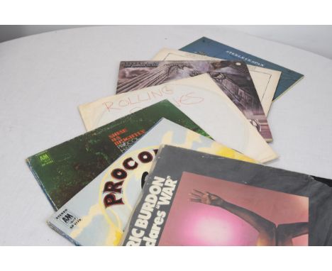 A mixed collection of 12' LPs including The Rolling Stones 'Through the Past Darkley' and Procol Harum. 