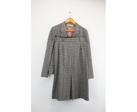 A women's cheque matching skirt and jacket with a pink inlay made by Mansfield. 
