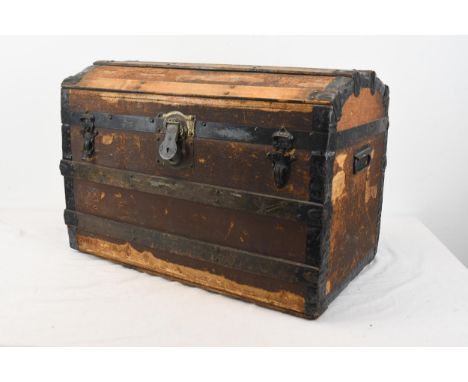 An old metal and timber bound trunk. 